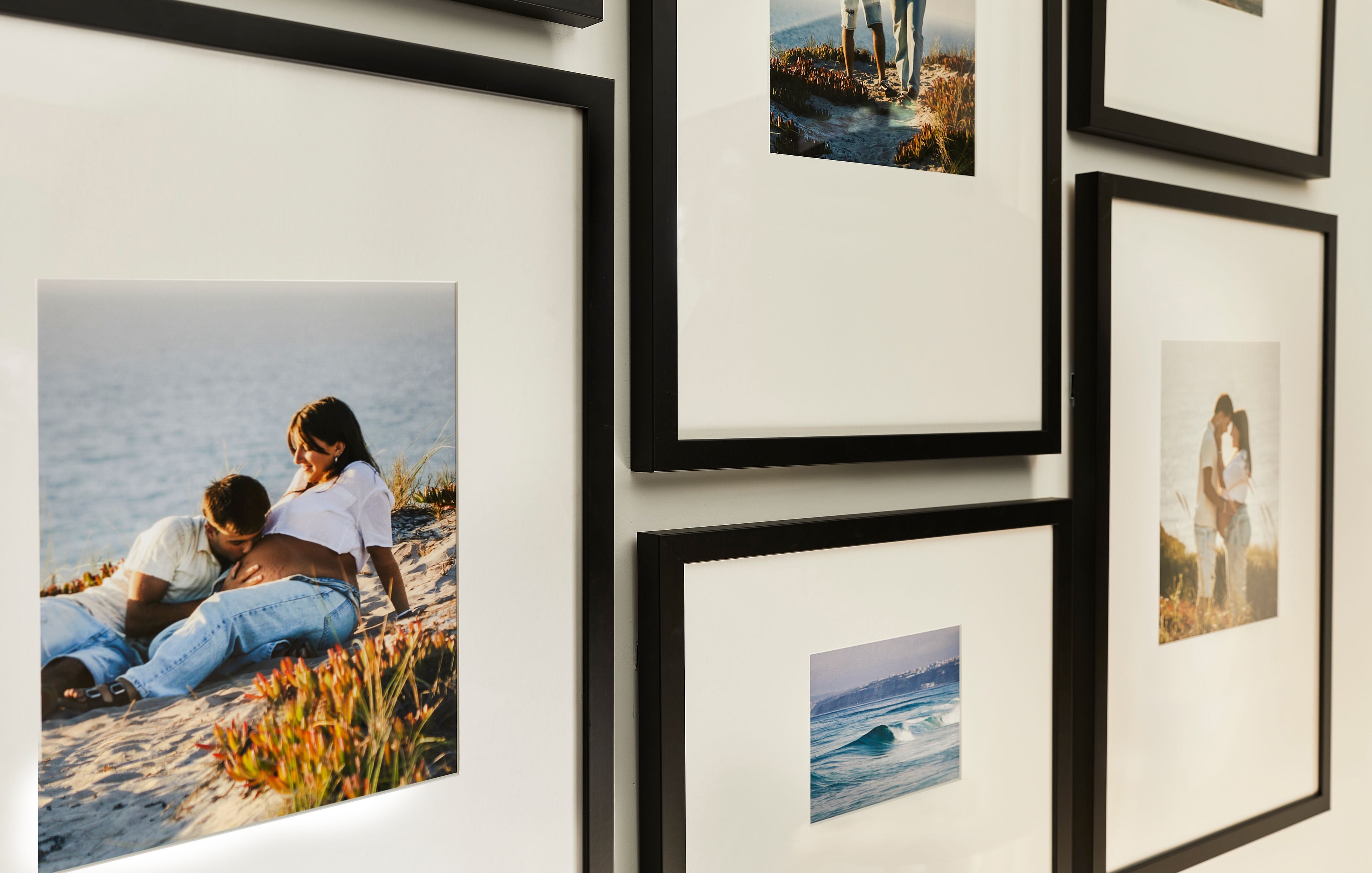 Close-up image of black Luxe Wall frames with an offset mat