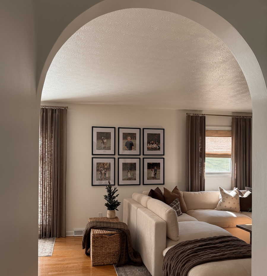 Classic Grid gallery wall with family photos in a living room