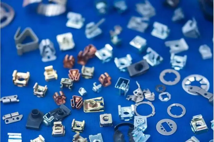 An array of small precision-machined metal components.