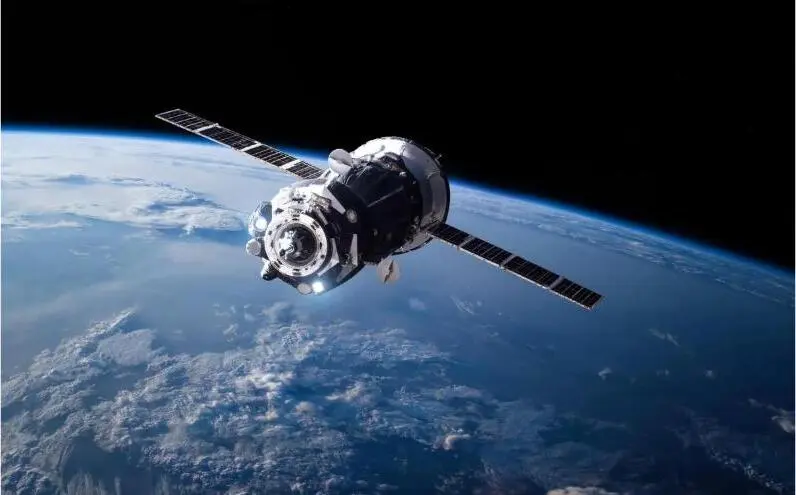 A satellite orbiting above the Earth.