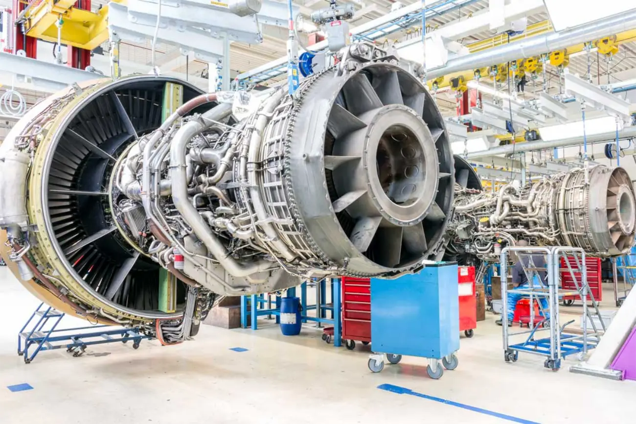 Jet engine on an aerospace assembly line, representing aerospace manufacturing