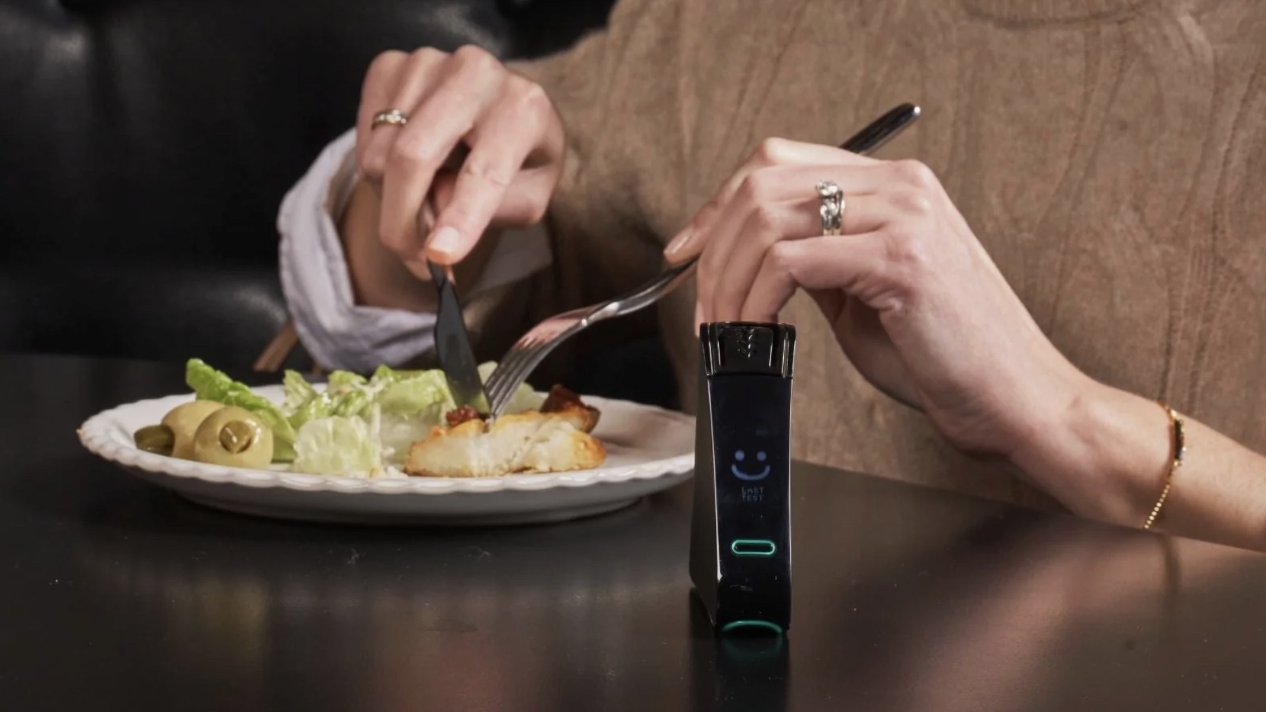With NIMA, in three minutes you get a smiley face or a "gluten found" symbol — no faint line to squint at, no judgment call to make.
